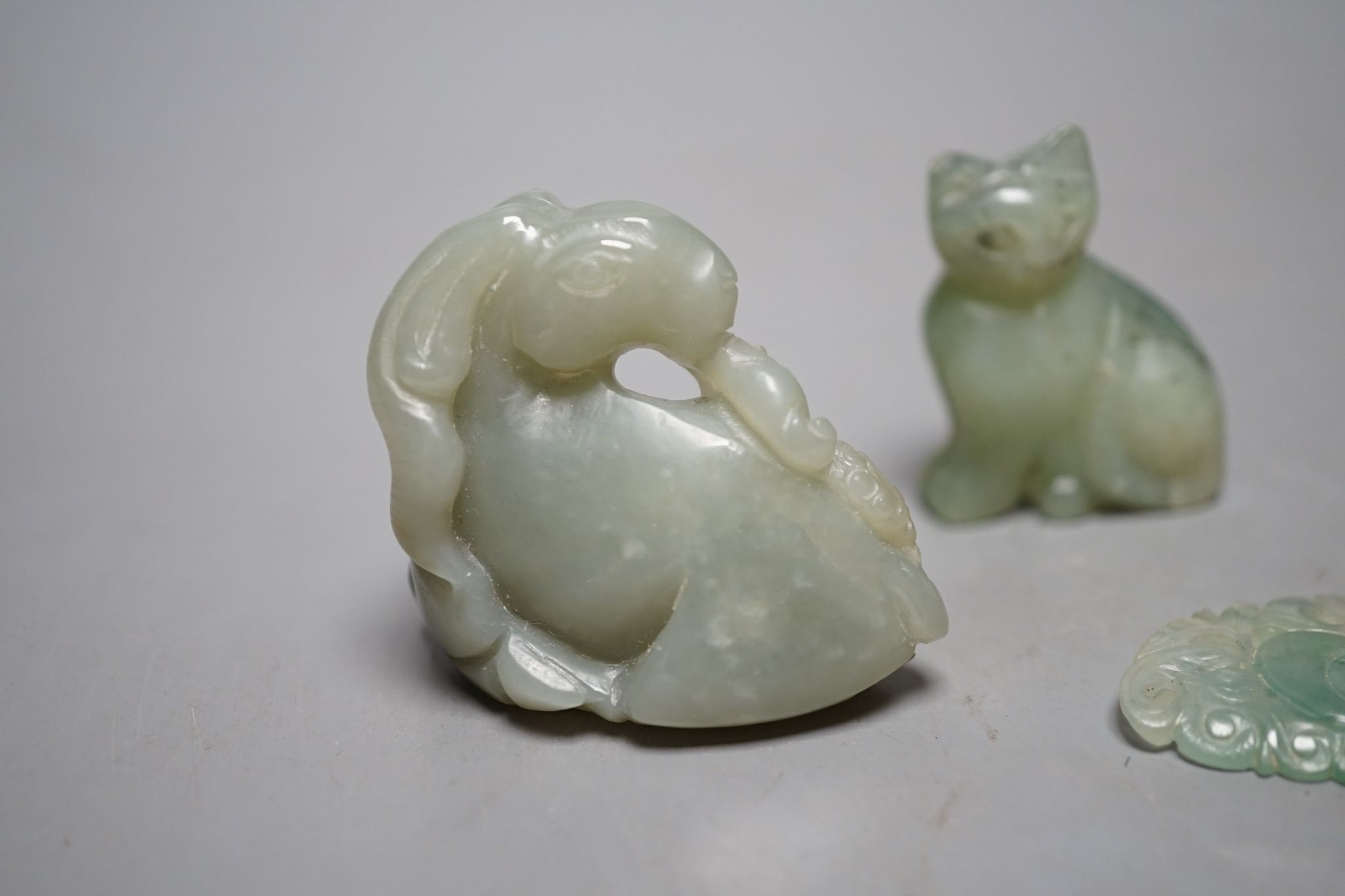 Four Chinese jade carvings of animals and fruit, tallest 4cm